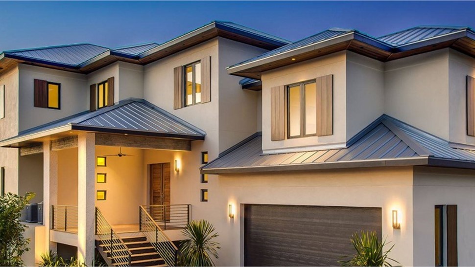 house with gray framed windows in the sunset